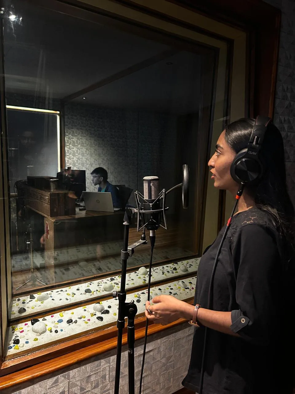 Dubbing room working to picture